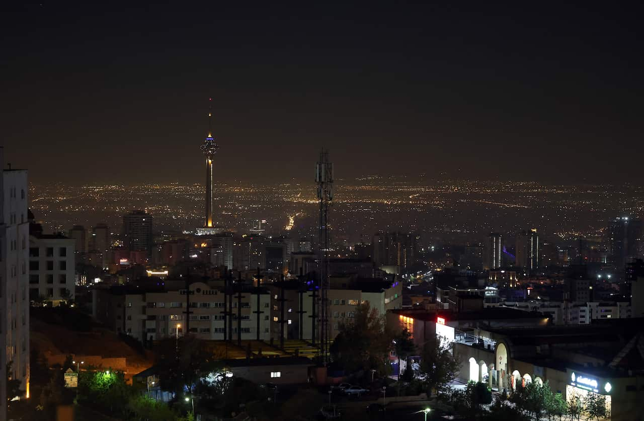 A city's skyline at night.