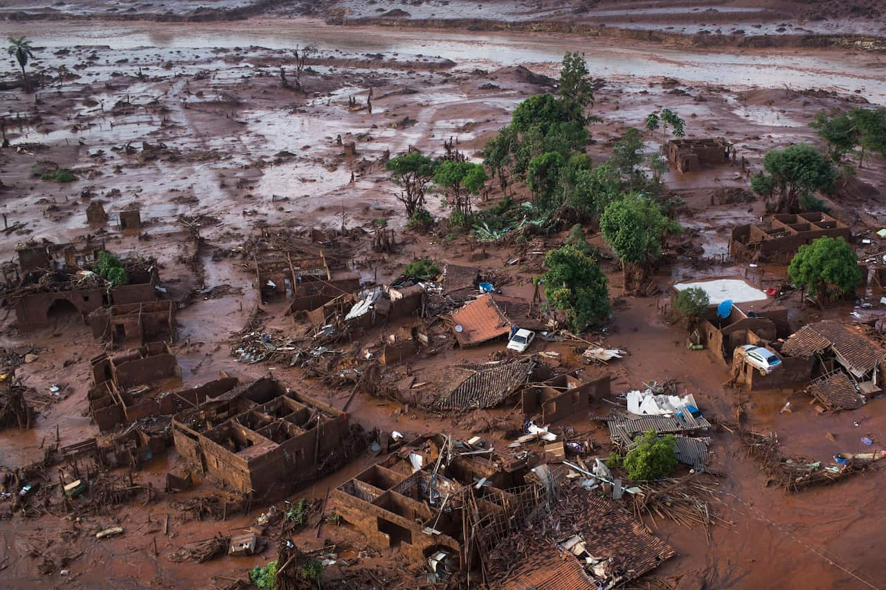 Houses buried in mud.