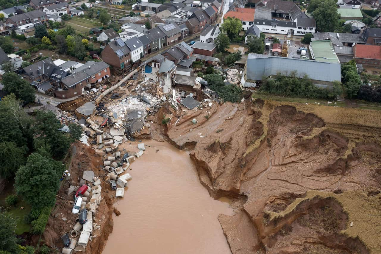 Aerial view of a sinkhole outside a town