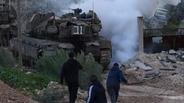 Tanks roll into the West Bank image