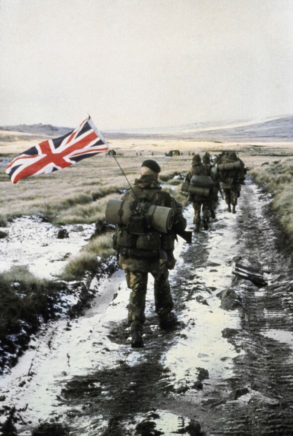 Iconic shot of 40 Commando Anti-Tank Troop marching towards the enemy in June 1982 