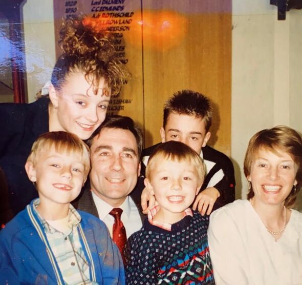 Rob, bottom left, with older sister Emma, dad Tony, brothers Matty and Jonathan and mum, Liz