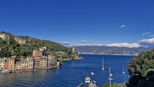 harbour in Portofino with Ligurian mountains in the background